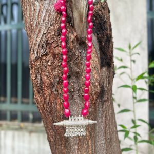 vintage pink stone warrior necklace